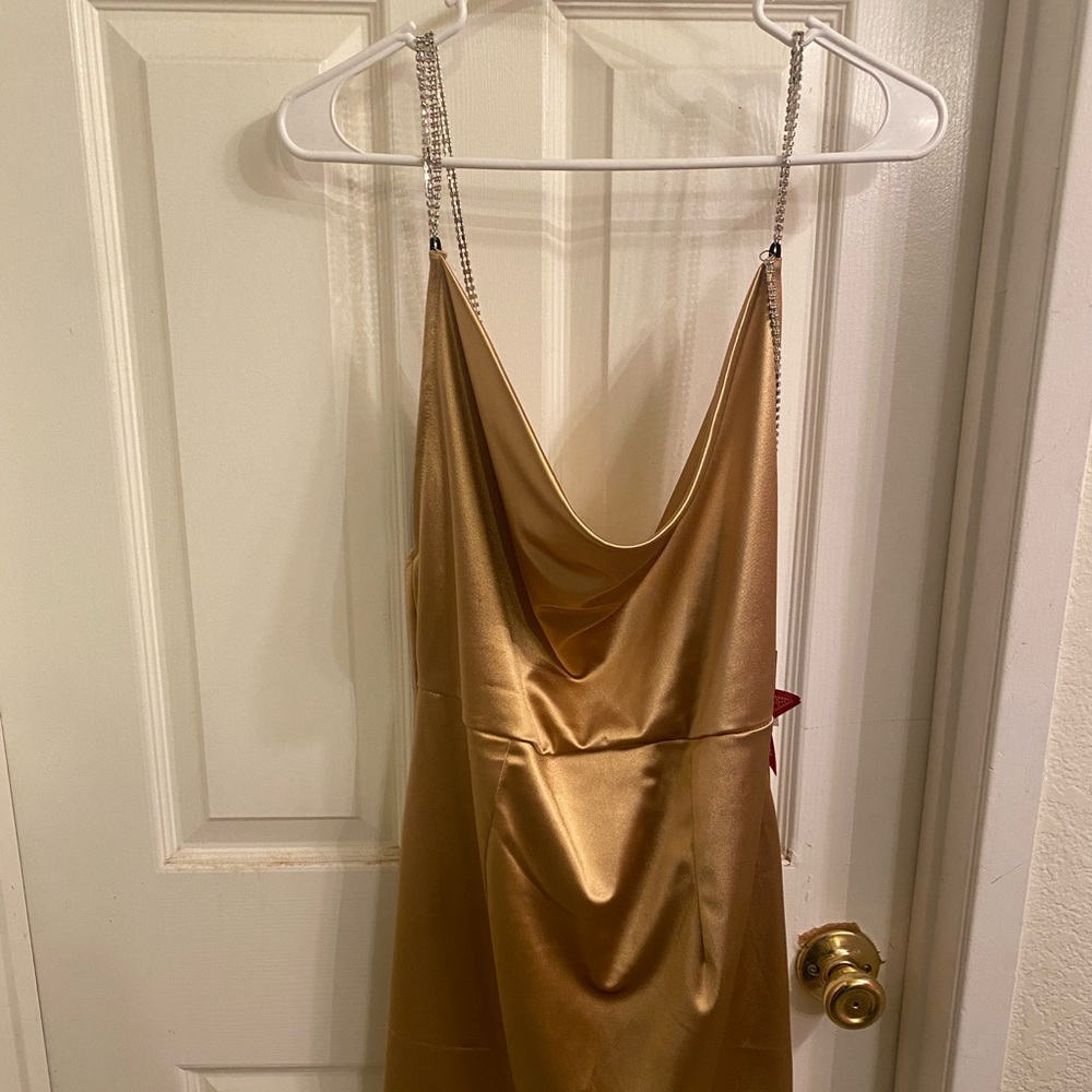 Tan backless dress.